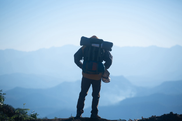 man-traveler-with-backpack-mountaineering-travel-lifestyle