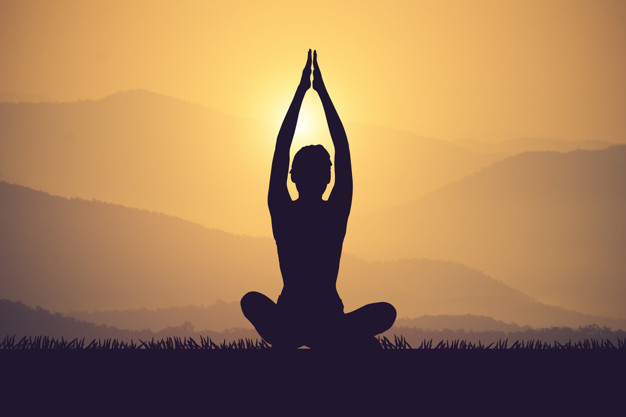 silhouette-young-woman-practicing-yoga-muontain-sunset